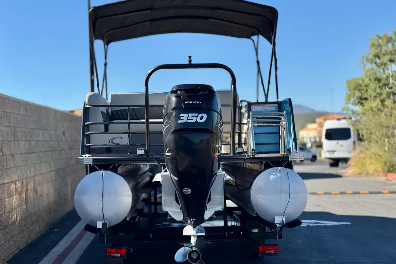 Slide: The Image of 2021 Crest Classic Platinum 240 SLC pontoon boat with powerful 350 Verado engine. - 5