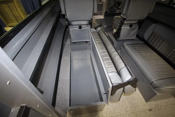 Slide: The Image of Interior of 2026 Alumaweld Horizon 24 boat with seating and storage compartments. - 12