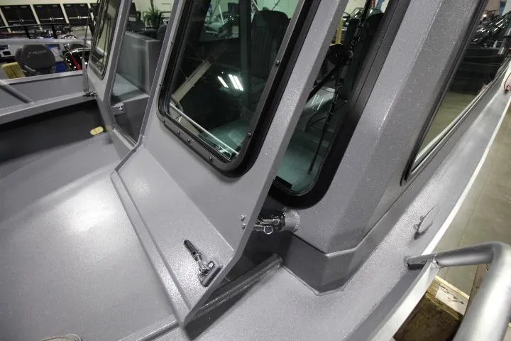 Slide: The Image of 2026 Alumaweld Horizon 24 boat deck with sleek, modern design and durable construction. - 6