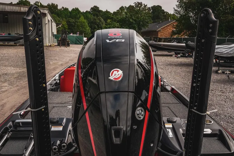 Slide: The Image of 2026 Bass Cat Cougar FTD Special Package boat with powerful V8 engine, parked outdoors. - 12
