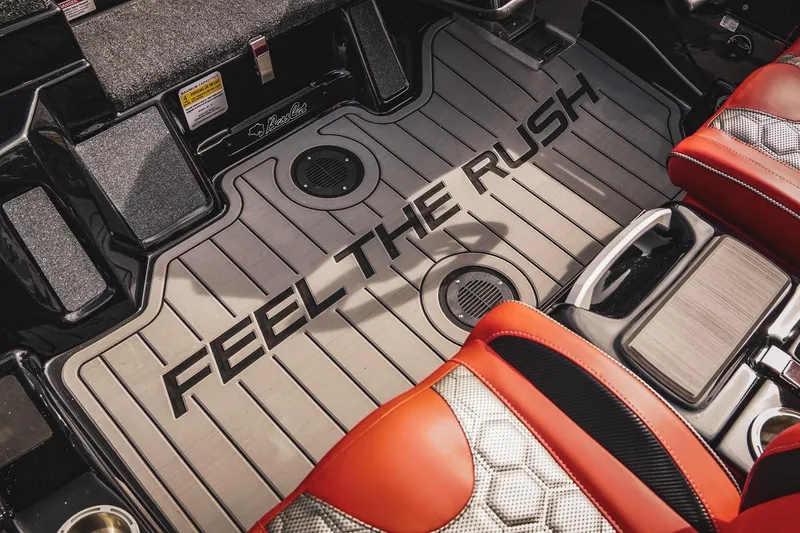 Slide: The Image of 2026 Bass Cat Cougar FTD interior with "Feel the Rush" floor design. - 21