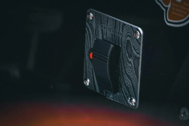 Slide: The Image of Master panel switch on 2026 Bass Cat Cougar FTD boat, close-up view. - 23