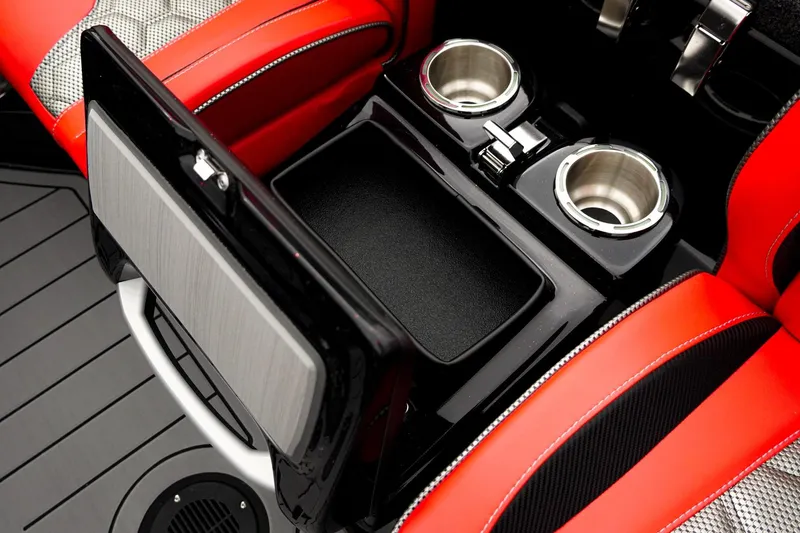 Slide: The Image of 2026 Bass Cat Cougar FTD interior with red seats and dual cup holders. - 38