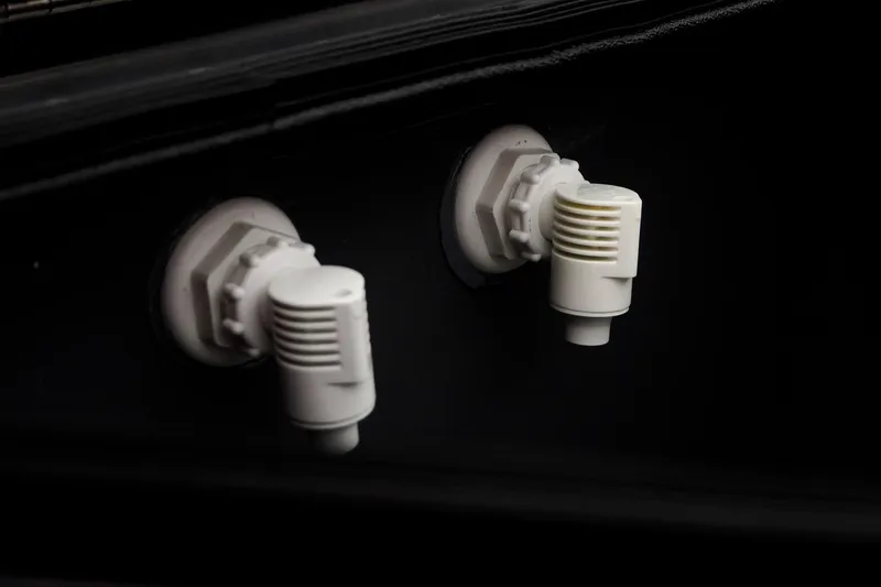 Slide: The Image of White fittings on a 2026 Bass Cat Cougar FTD boat, special package detail. - 41