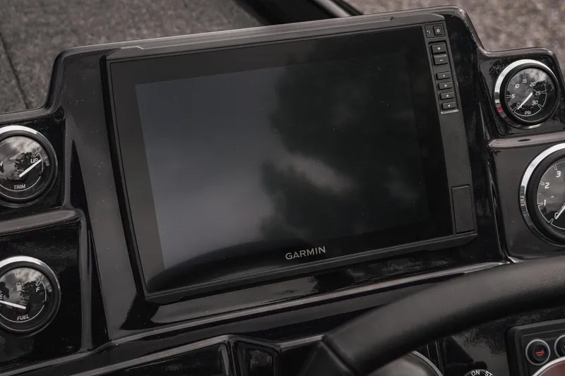 Slide: The Image of Dashboard of 2026 Bass Cat Cougar FTD with Garmin display and gauges. - 50