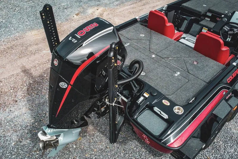 Slide: The Image of 2026 Bass Cat Cougar FTD Special Package boat with powerful engine and sleek design. - 53