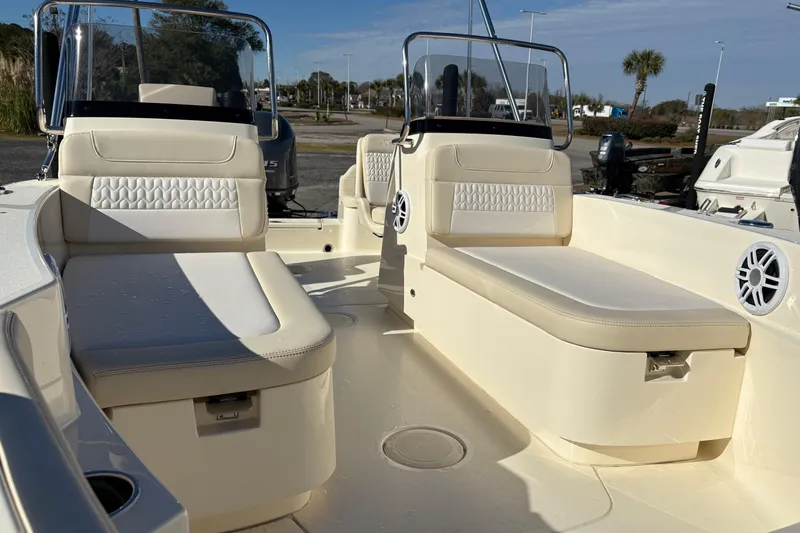 Slide: The Image of 2026 Scout 188 Sport Dorado boat interior with seating and cup holders. - 15