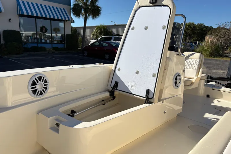 Slide: The Image of Close-up of 2026 Scout 188 Sport Dorado emblem on boat exterior. - 18