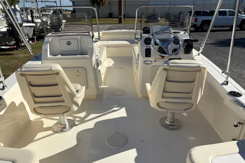 Slide: The Image of 2026 Scout 188 Sport Dorado boat swim platform with ladder and safety warnings. - 20