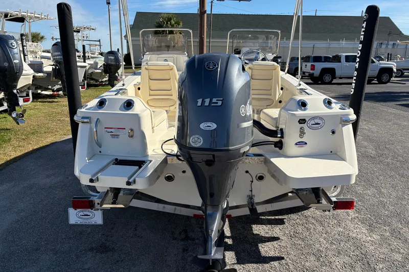 Slide: The Image of 2026 Scout 188 Sport Dorado boat with Yamaha engine on trailer, outdoor display. - 3