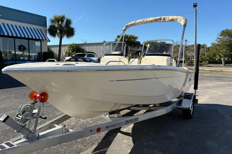 Slide: The Image of 2026 Scout 188 Sport Dorado boat interior with Yamaha 115 four-stroke engine. - 8