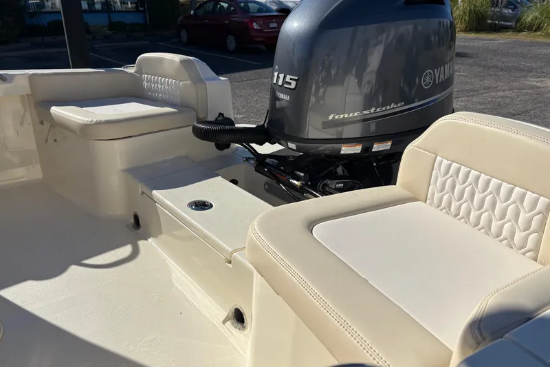 Slide: The Image of 2026 Scout 188 Sport Dorado boat interior with luxurious seating and steering wheel. - 9