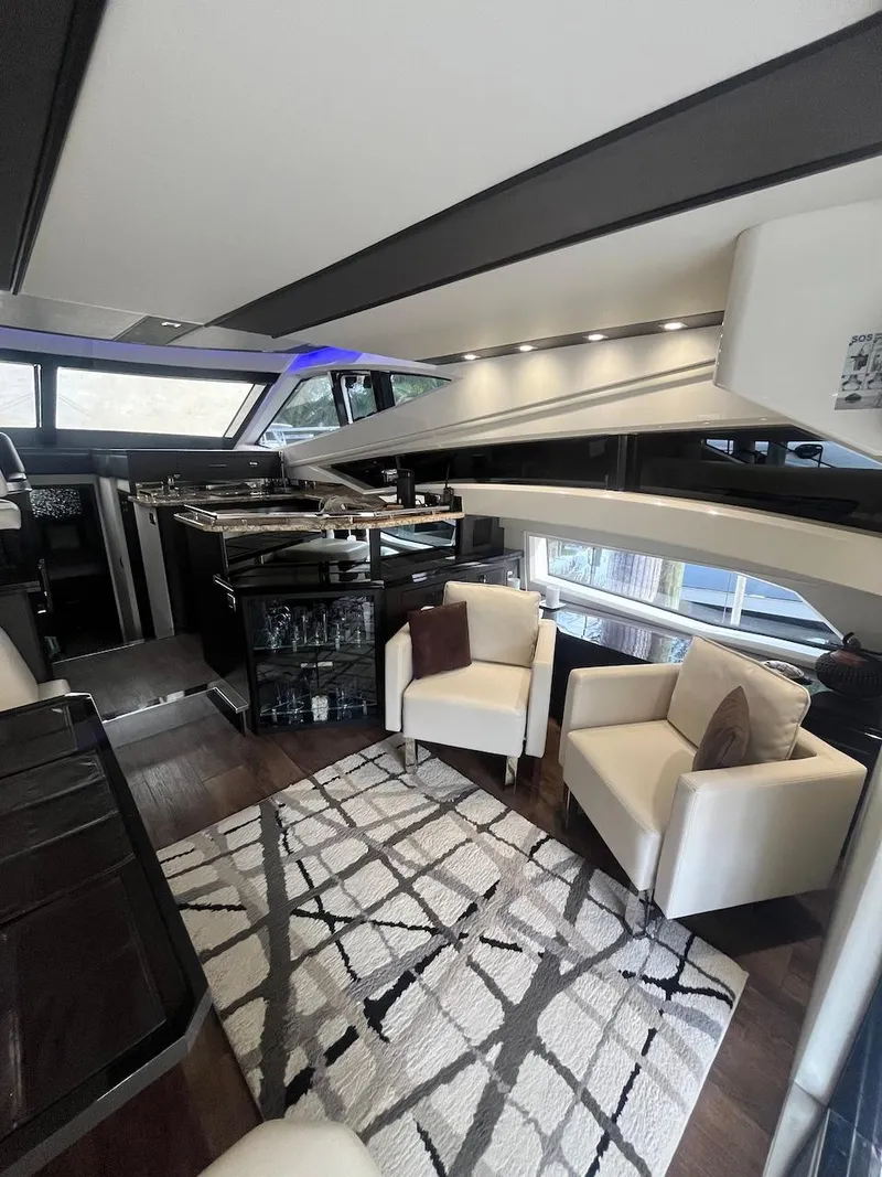 Slide: The Image of Luxurious interior of a 2017 Marquis 500 Sport Yacht with modern furnishings. - 30