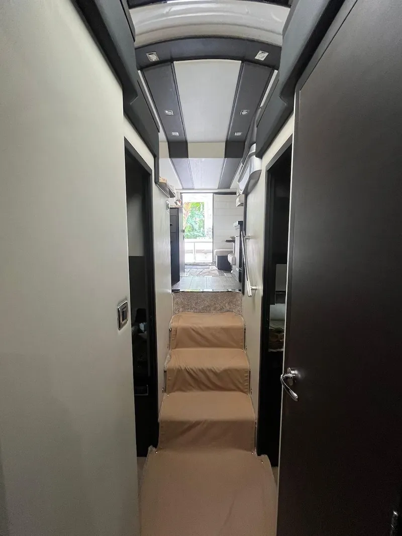 Slide: The Image of Interior hallway of a 2017 Marquis 500 Sport Yacht with modern design. - 36