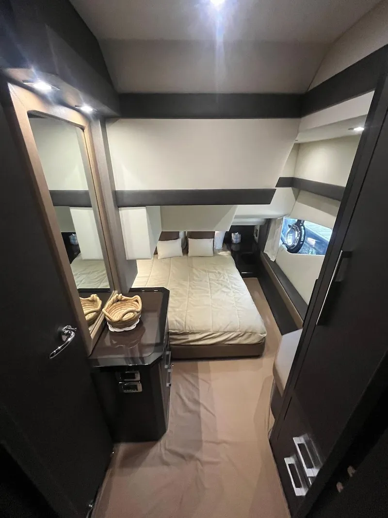 Slide: The Image of 2017 Marquis 500 Sport Yacht bedroom with modern interior design. - 41