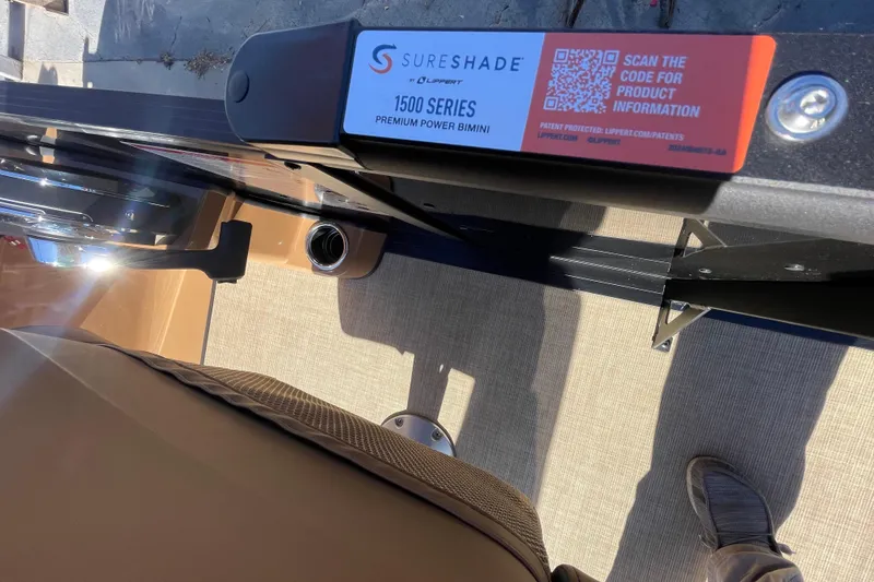 Slide: The Image of 2026 Harris Cruiser 210 with SureShade 1500 Series Premium Power Bimini. - 7