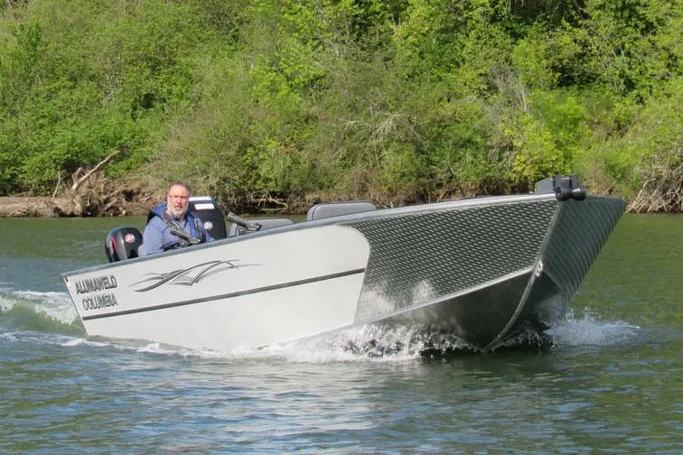 Slide: The Image of Manufacturer Provided Image: 2026 Alumaweld Columbia 21 boat cruising on a river. - 18