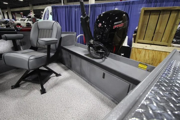 Slide: The Image of 2026 Alumaweld Columbia 21 boat interior with Mercury Pro XS engine and seating. - 4