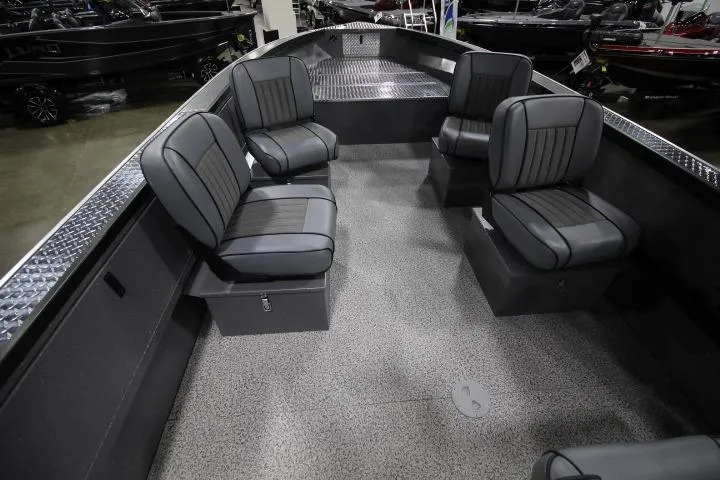 Slide: The Image of 2026 Alumaweld Columbia 21 boat interior with gray seating and spacious layout. - 5