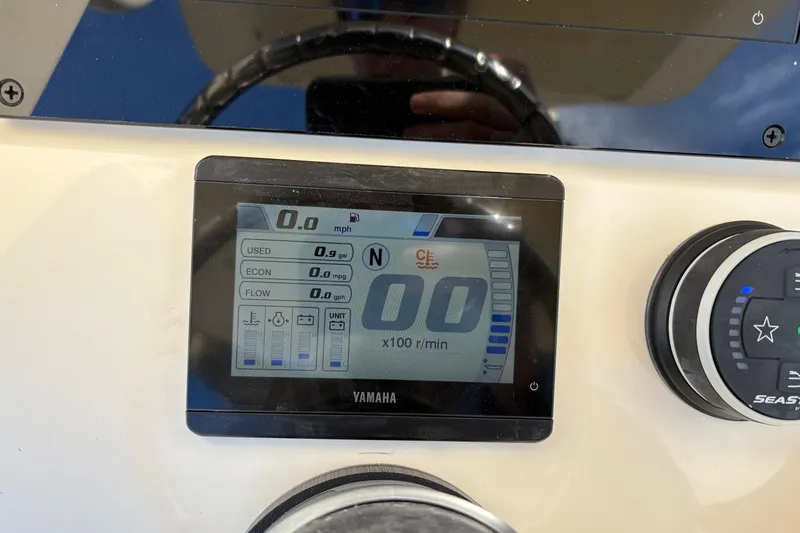 Slide: The Image of Yamaha display on 2026 Scout 231 XSB boat dashboard showing speed and fuel data. - 17