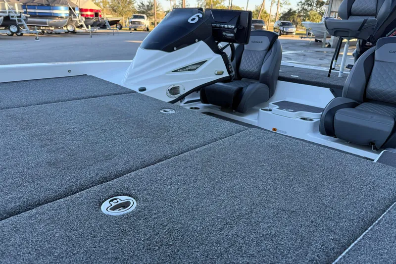 Slide: The Image of 2022 Caymas CX 20 PRO boat interior with seating and control panel. - 14