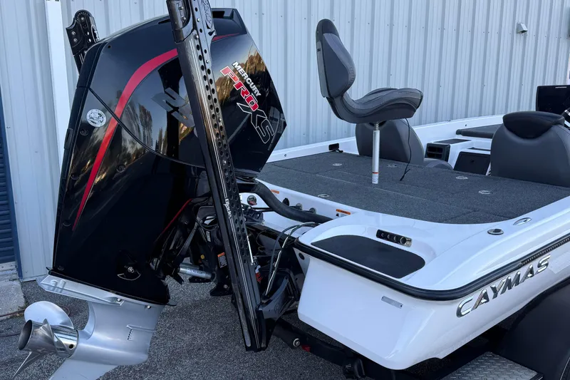 Slide: The Image of 2022 Caymas CX 20 PRO boat with Mercury engine, featuring sleek design and comfortable seating. - 4