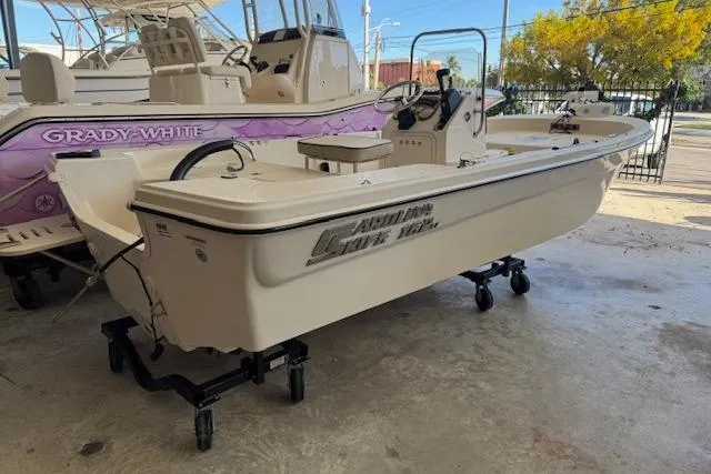 The Image of 2023 Carolina Skiff 162 JLS boat displayed outdoors on a trailer. - 1