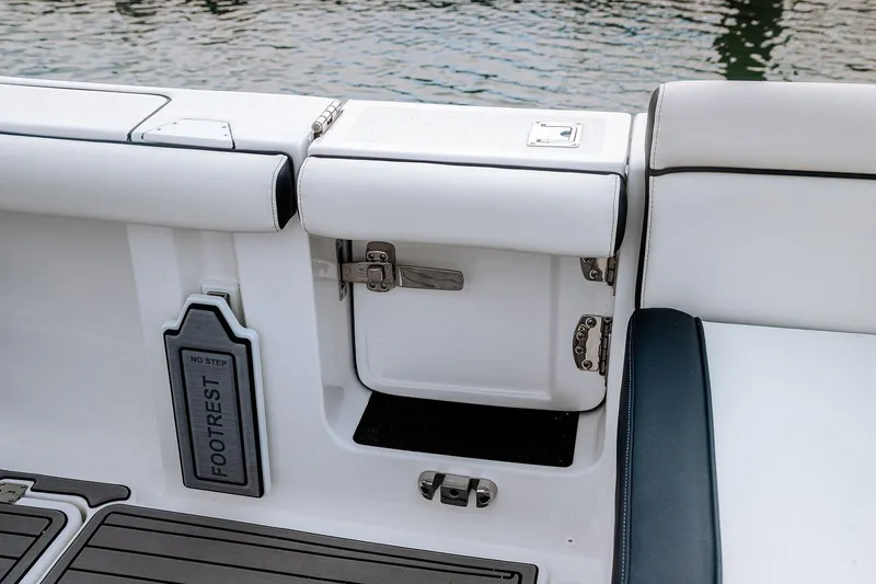 Slide: The Image of 2026 Tidewater 256 LXF boat with dual engines at Lakeside Marina. - 17