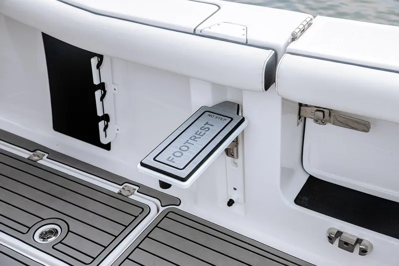 Slide: The Image of 2026 Tidewater 256 LXF boat with dual outboard motors at Lakeside Marina. - 18