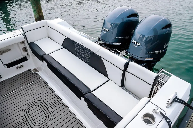 Slide: The Image of 2026 Tidewater 256 LXF boat interior with advanced navigation system in showroom. - 41