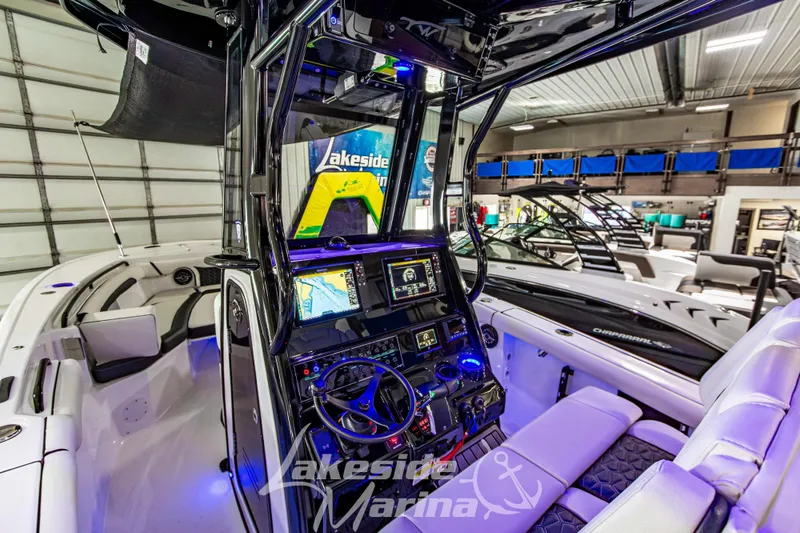 Slide: The Image of 2026 Tidewater 256 LXF boat interior with advanced navigation system at Lakeside Marina. - 67