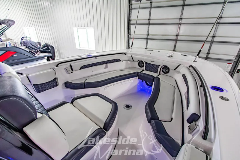 Slide: The Image of 2026 Tidewater 256 LXF boat interior with luxurious seating and modern design. - 89