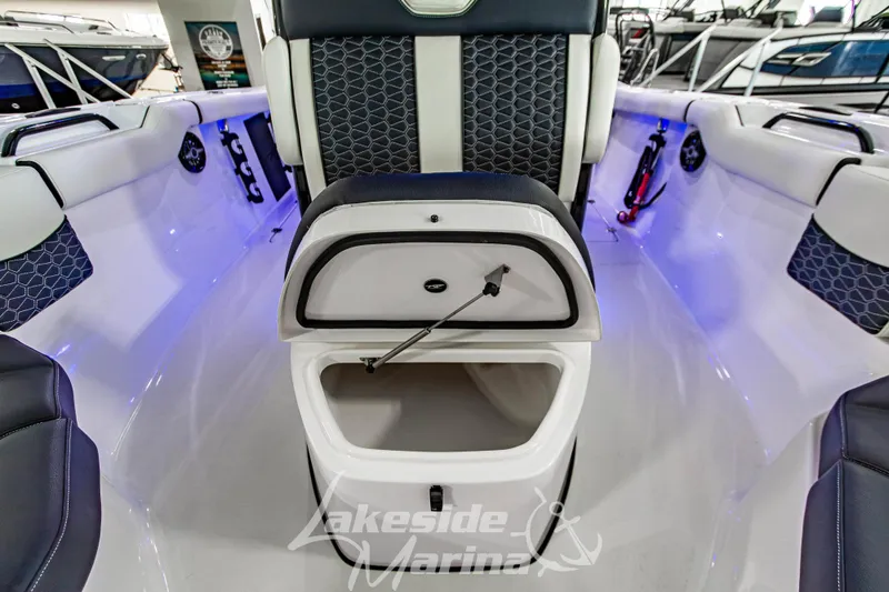Slide: The Image of 2026 Tidewater 256 LXF boat interior with open storage compartment at Lakeside Marina. - 98