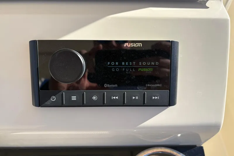 Slide: The Image of Fusion audio system in 2026 Scout 240 XSF boat, featuring Bluetooth and SiriusXM. - 20