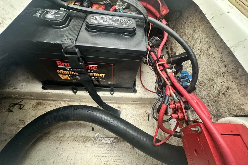 Slide: The Image of Battery compartment of 2020 NauticStar 2140 Sport Shallow Bay boat with wiring. - 20