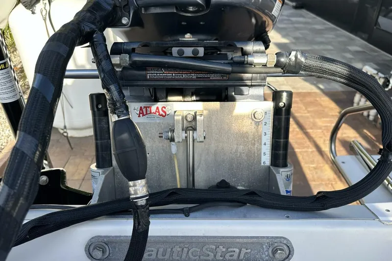 Slide: The Image of Close-up of 2020 NauticStar 2140 Sport Shallow Bay boat engine components. - 31