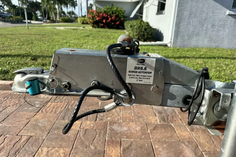 Slide: The Image of Trailer surge actuator for 2020 NauticStar 2140 Sport Shallow Bay boat. - 53