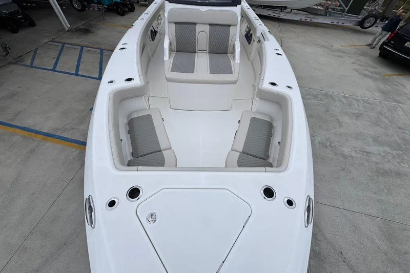 Slide: The Image of 2026 Solace 35 CS boat interior with cushioned seating and sleek design. - 22