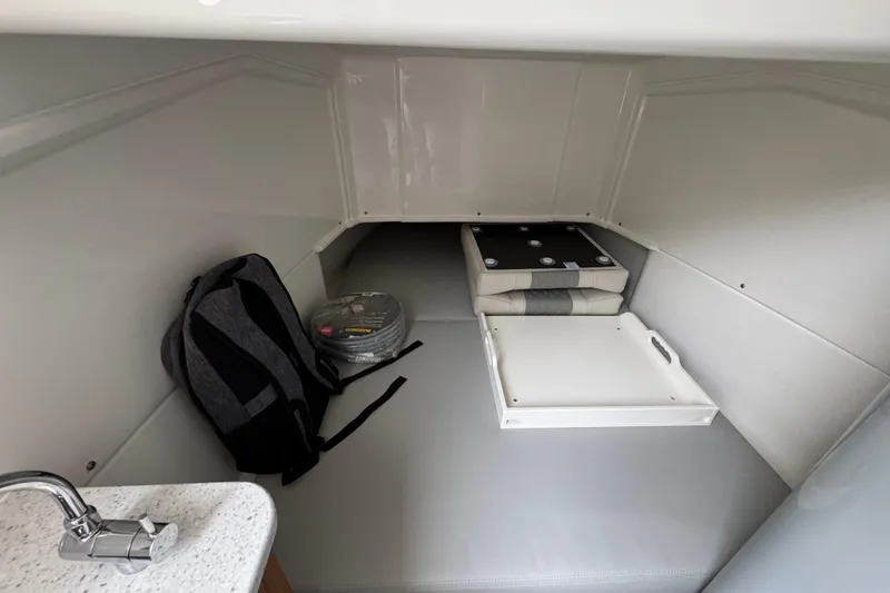 Slide: The Image of Interior cabin of 2026 Solace 35 CS boat with storage and seating area. - 28