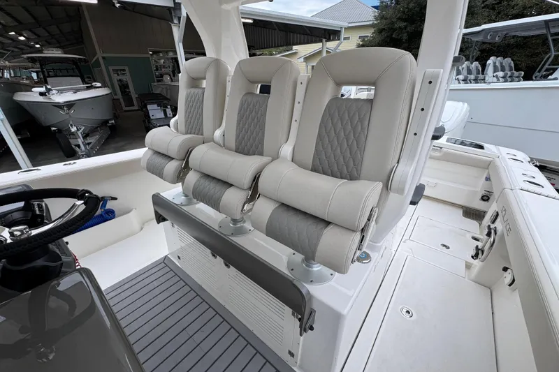 Slide: The Image of Luxury seating on 2026 Solace 35 CS boat, featuring plush, ergonomic design. - 34