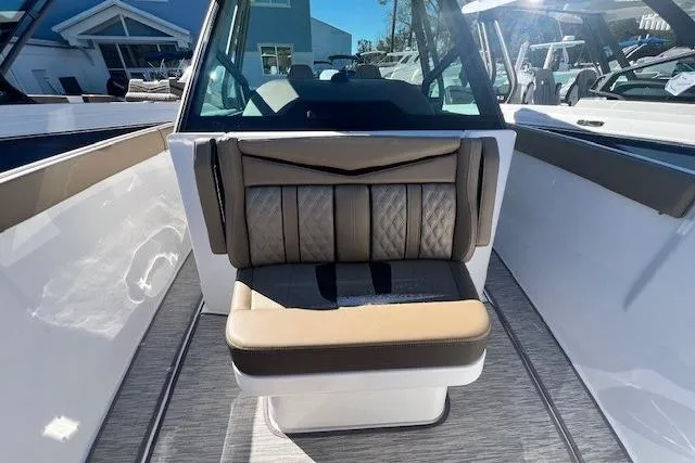Slide: The Image of Interior view of 2026 Monterey Elite 27 OB boat with dual captain seats. - 13