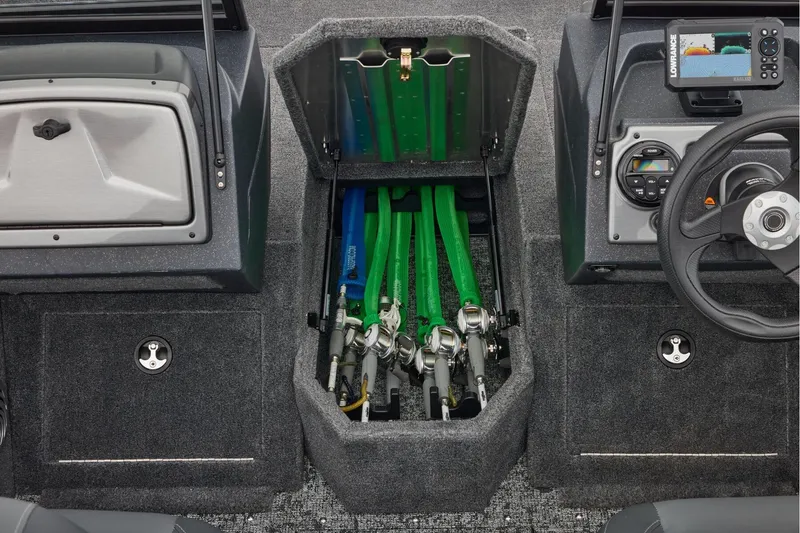 Slide: The Image of Manufacturer Provided Image: 2026 Tracker Pro Guide V-175 Combo boat interior with rod storage and control panel. - 24