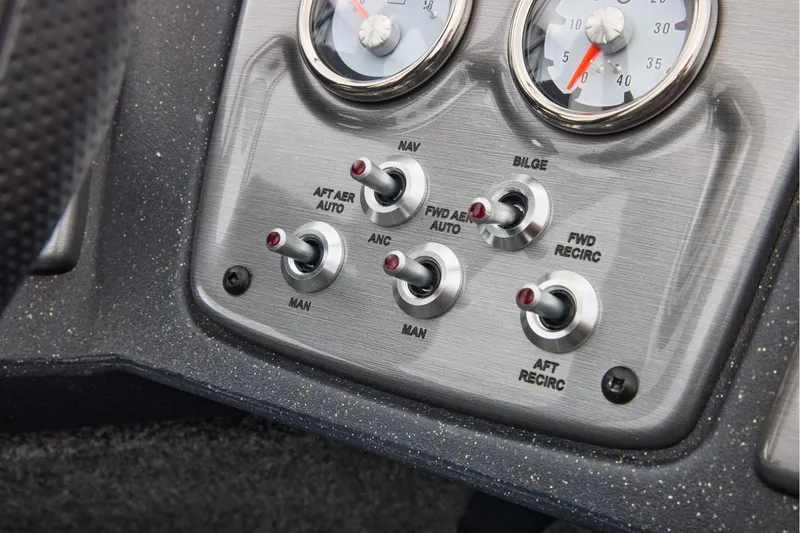 Slide: The Image of Manufacturer Provided Image: Control panel of 2026 Tracker Pro Guide V-175 Combo boat with switches and gauges. - 31