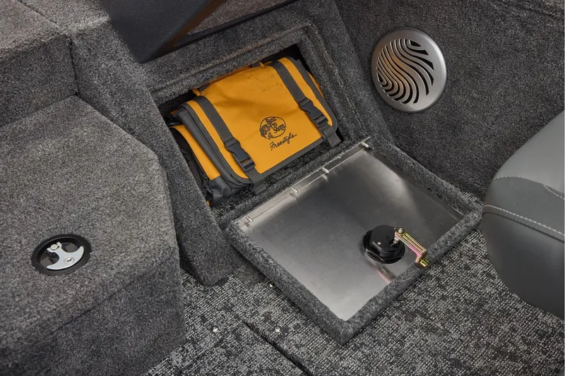Slide: The Image of Manufacturer Provided Image: 2026 Tracker Pro Guide V-175 Combo interior storage compartment with speaker and safety equipment. - 32