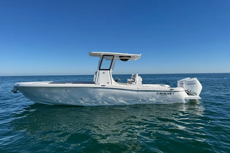 The Image of 2026 Caymas 291 boat on open water under clear blue sky. - 0