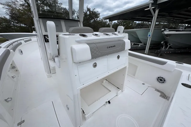 Slide: The Image of 2026 Caymas 291 boat interior with storage compartments and seating. - 41