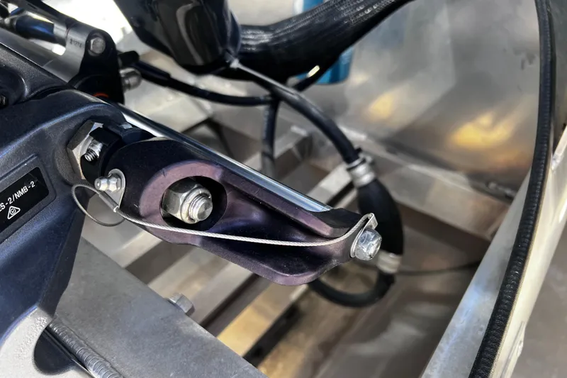 Slide: The Image of Close-up of mechanical components on a 2022 Godfrey Monaco 235 SFL boat. - 16