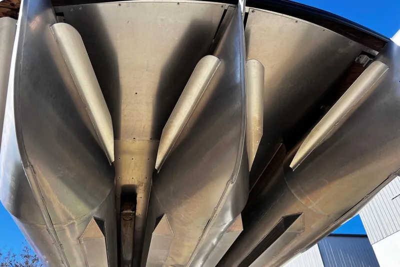 Slide: The Image of Underside view of 2022 Godfrey Monaco 235 SFL pontoon boat, showcasing aluminum pontoons. - 23