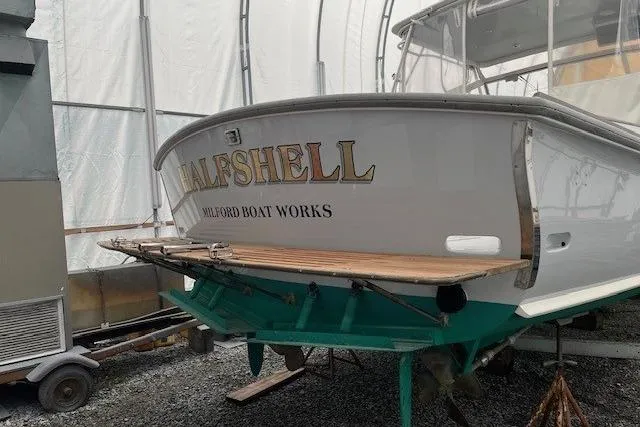 Slide: The Image of 1978 Dyer 40 Express Cruiser "Halfshell" in storage at Milford Boat Works. - 11