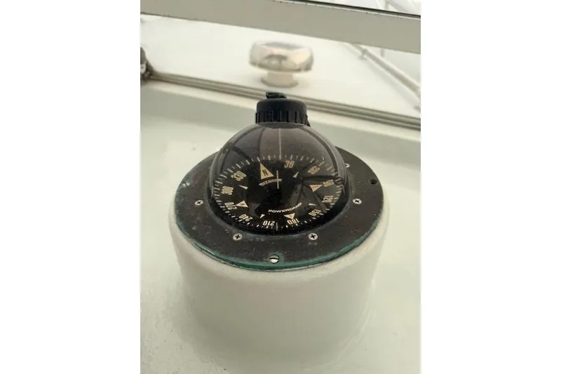 Slide: The Image of Compass on 1978 Dyer 40 Custom Express Cruiser, showcasing navigation equipment. - 33